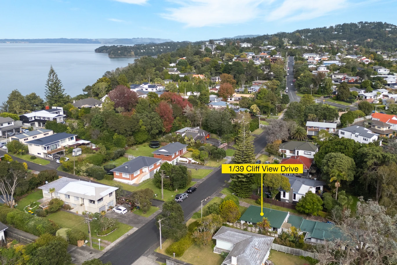 Once in 26 years, Constructed in block, 2 beds 1 bath home with garage, close to Green Bay Village, quality schooling, and public transport, With a park and playground just a short stroll away, 1/39 Cliff View Drive, Green Bay, Auckland