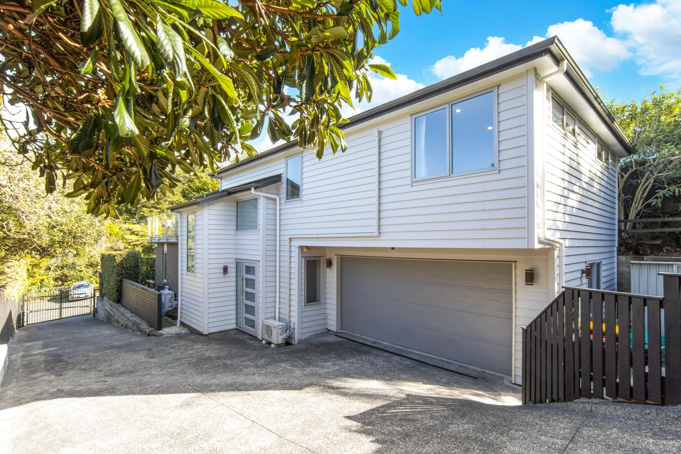 Sea views, 247m2 5 beds 3.5 baths house with double garage on 429m2 section, in an uphill from the harbour’s edge and opposite a native bush reserve, walking distance to Blockhouse Bay Village, local amenities, and coastal reserves, in zone for Blockhouse Bay School and Lynfield College, 48 Lewis Street, Blockhouse Bay, Auckland