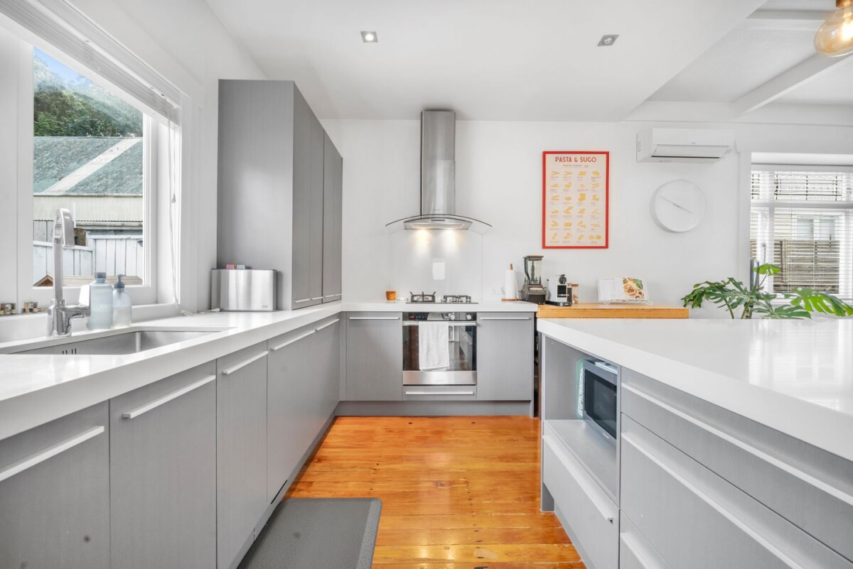 Move-in ready, 141m2 Renovated 3 beds 2 baths house with car parks on 474m2 section, fully fenced, along with recently renovated bathrooms, including a contemporary family bathroom and a stylish ensuite, 69 Rockfield Road, Penrose, Auckland