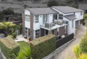 Sea views, 247m2 5 beds 3.5 baths house with double garage on 429m2 section, in an uphill from the harbour’s edge and opposite a native bush reserve, walking distance to Blockhouse Bay Village, local amenities, and coastal reserves, in zone for Blockhouse Bay School and Lynfield College, 48 Lewis Street, Blockhouse Bay, Auckland