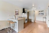 Vendors determined to sell, 67m2 2 beds 1 bath home with car park and a private backyard,, close to shops, schools, easy motorway access, 1/242 Great North Road, Henderson, Auckland
