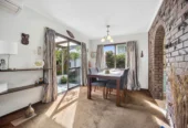 Once in 26 years, Constructed in block, 2 beds 1 bath home with garage, close to Green Bay Village, quality schooling, and public transport, With a park and playground just a short stroll away, 1/39 Cliff View Drive, Green Bay, Auckland