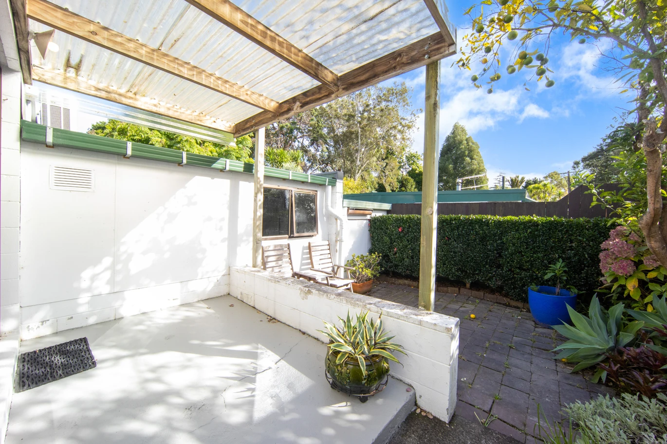 Once in 26 years, Constructed in block, 2 beds 1 bath home with garage, close to Green Bay Village, quality schooling, and public transport, With a park and playground just a short stroll away, 1/39 Cliff View Drive, Green Bay, Auckland