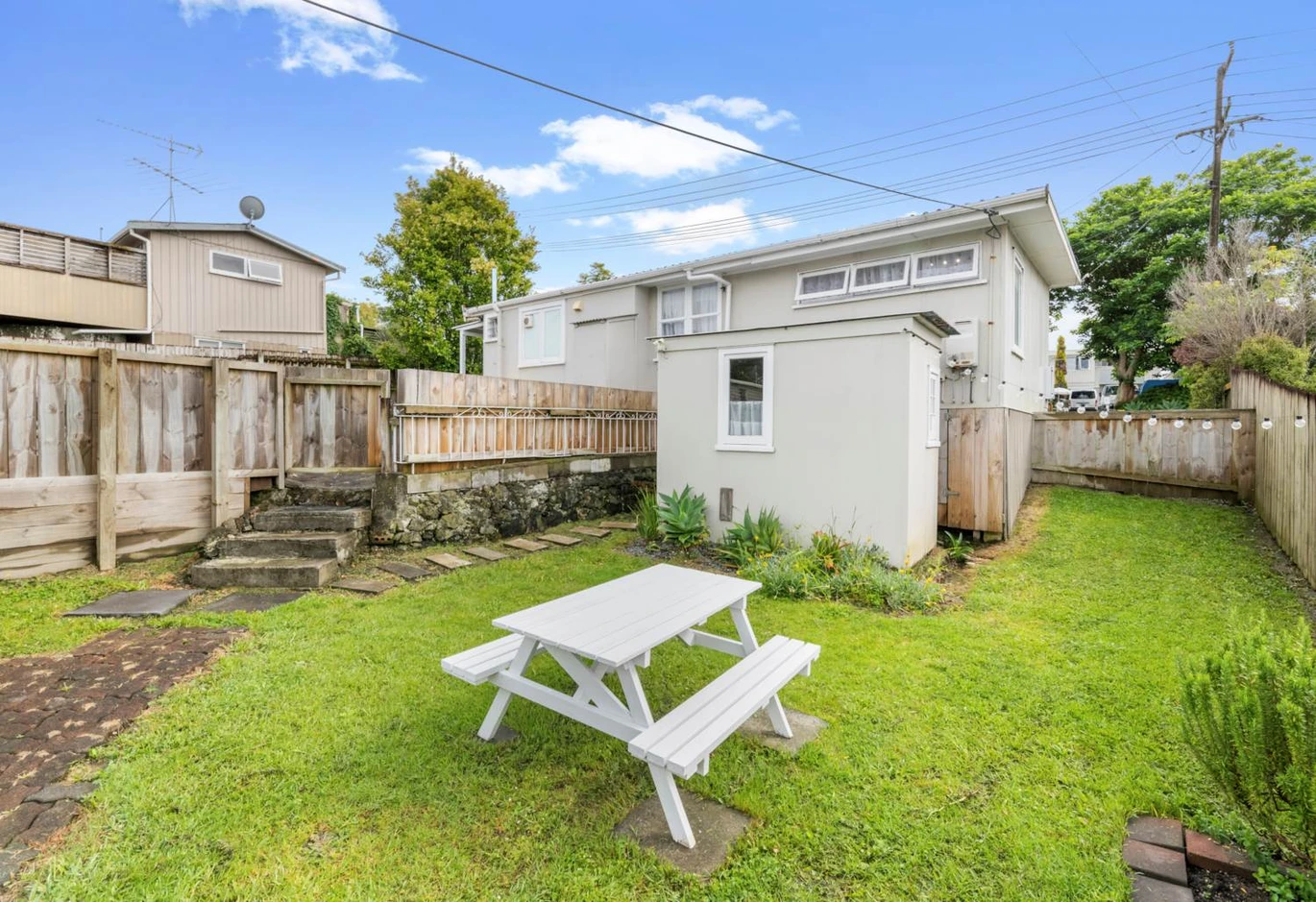 Home and income on 864m2 section, 2 beds 1 bath main house + standalone 1 bed 1 bath second dwelling with garage, both currently rented for $915 per week, Easy walking distance to Stanmore Bay Beach, local schools, shops, cafés, and leisure facilities, welcome all conjunctional sales. 25 Penton Road, Stanmore Bay, Auckland