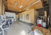 Vendor Says Sell – All Offers Considered, 4 beds 2 baths house on share of 1356m2, Recently constructed studio (CCC issued), Relocated 3-bedroom dwelling (unfinished), Expansive garage space, Walking distance to Sylvia Park, IKEA, and public transport (bus & train), Prospective purchasers are advised that certain works on the property may not have obtained neighbouring cross-lease consent, 19 Mclennan Road, Mount Wellington, Auckland