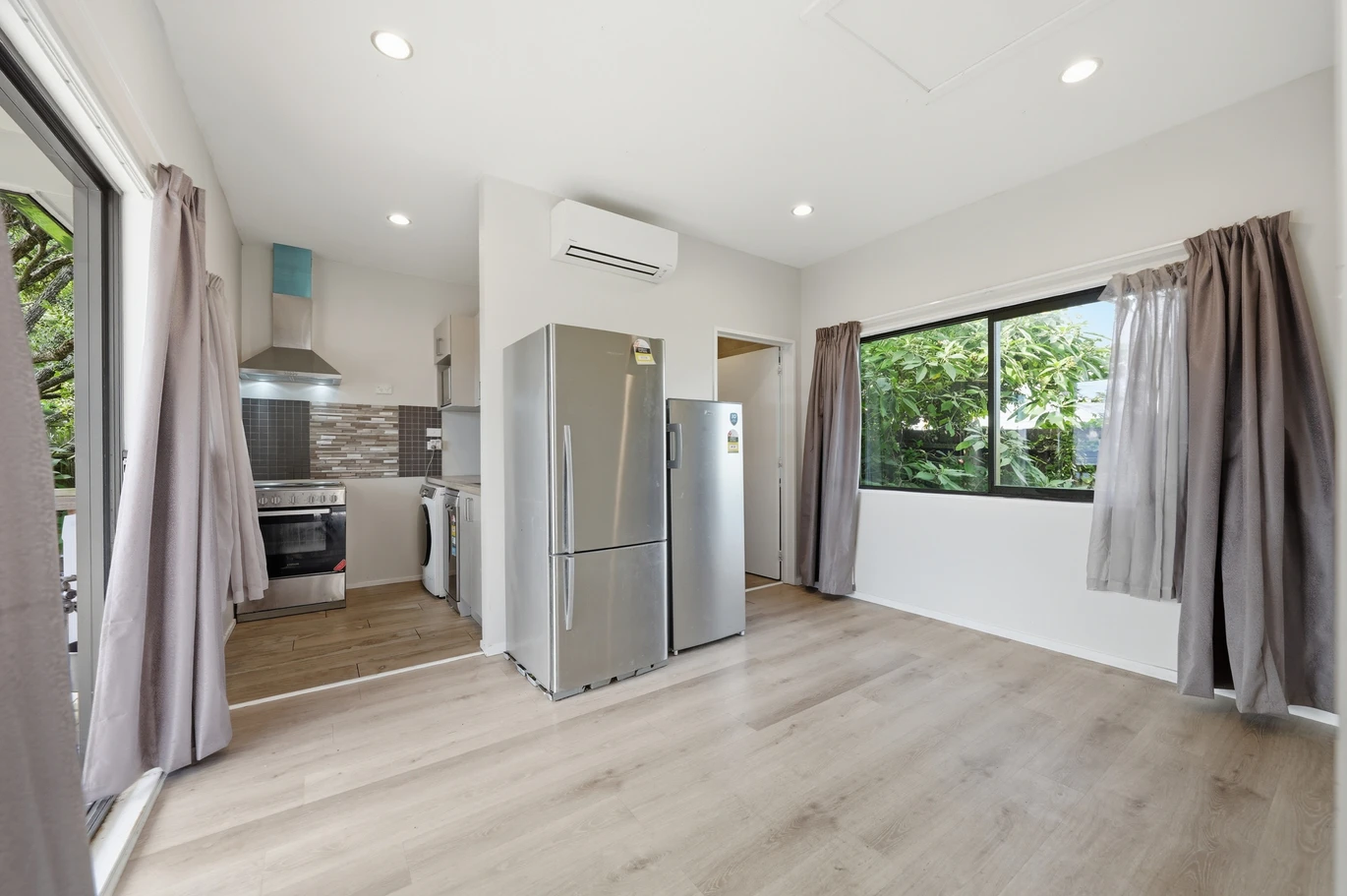 Vendor Says Sell – All Offers Considered, 4 beds 2 baths house on share of 1356m2, Recently constructed studio (CCC issued), Relocated 3-bedroom dwelling (unfinished), Expansive garage space, Walking distance to Sylvia Park, IKEA, and public transport (bus & train), Prospective purchasers are advised that certain works on the property may not have obtained neighbouring cross-lease consent, 19 Mclennan Road, Mount Wellington, Auckland