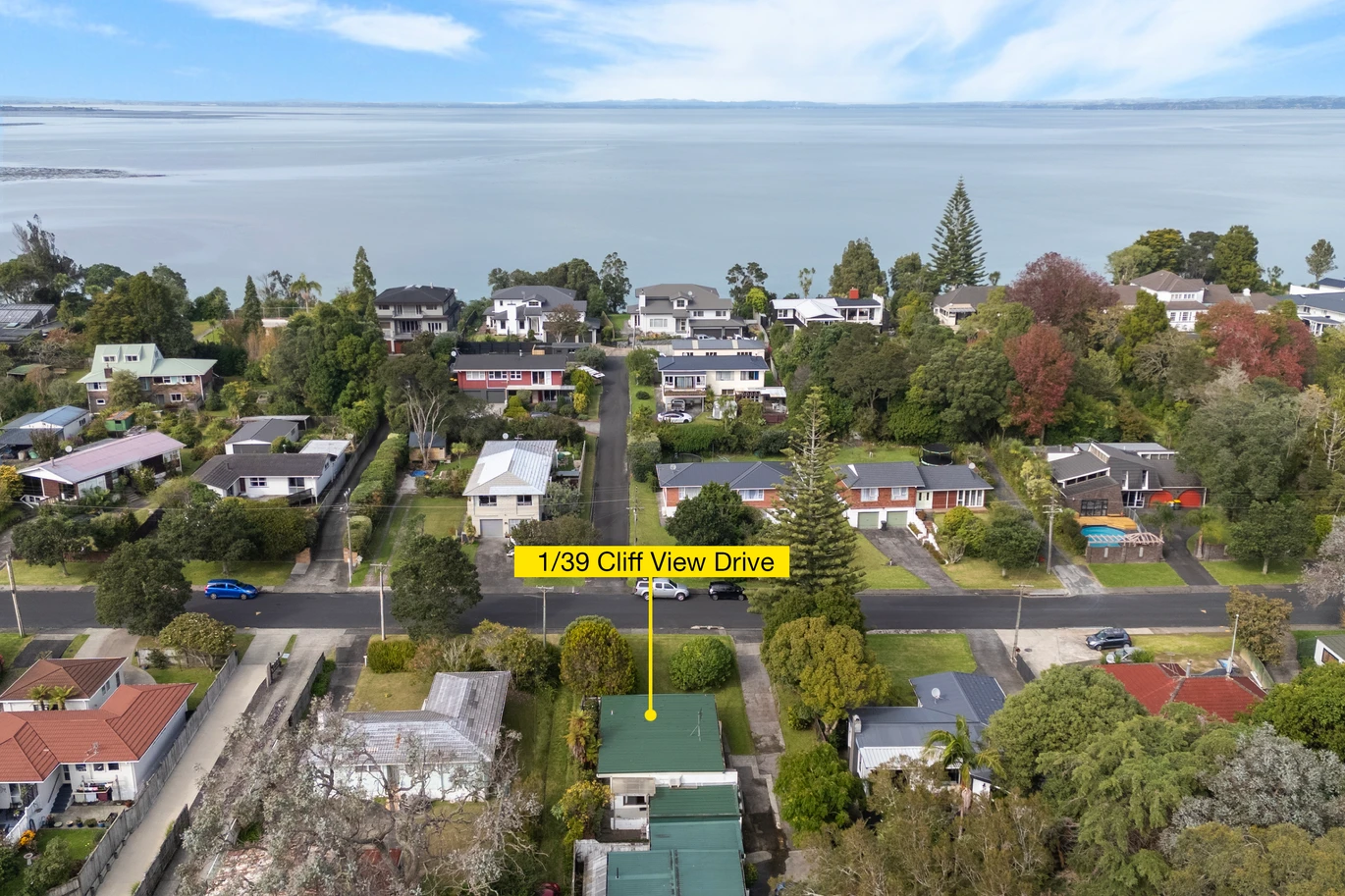 Once in 26 years, Constructed in block, 2 beds 1 bath home with garage, close to Green Bay Village, quality schooling, and public transport, With a park and playground just a short stroll away, 1/39 Cliff View Drive, Green Bay, Auckland
