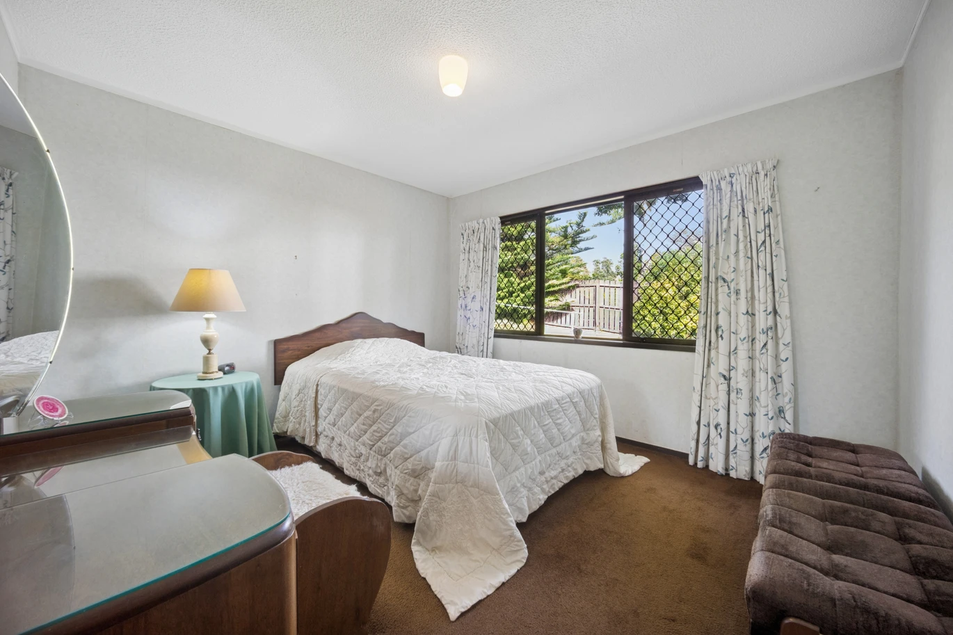 Once in 26 years, Constructed in block, 2 beds 1 bath home with garage, close to Green Bay Village, quality schooling, and public transport, With a park and playground just a short stroll away, 1/39 Cliff View Drive, Green Bay, Auckland
