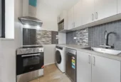 Vendor Says Sell – All Offers Considered, 4 beds 2 baths house on share of 1356m2, Recently constructed studio (CCC issued), Relocated 3-bedroom dwelling (unfinished), Expansive garage space, Walking distance to Sylvia Park, IKEA, and public transport (bus & train), Prospective purchasers are advised that certain works on the property may not have obtained neighbouring cross-lease consent, 19 Mclennan Road, Mount Wellington, Auckland