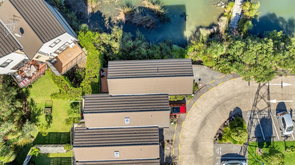Owners have bought – Must sell, 132m2 2 beds 1 bath home with garage for 2 cars, Enjoy peaceful outlooks with lovely views across the pond, close to local amenities, schools, and transport links, 80/172 McLeod Road, Te Atatu South, Auckland