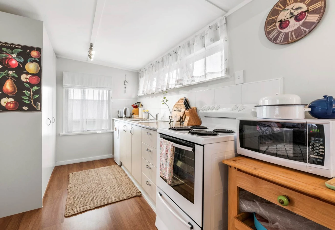 Home and income on 864m2 section, 2 beds 1 bath main house + standalone 1 bed 1 bath second dwelling with garage, both currently rented for $915 per week, Easy walking distance to Stanmore Bay Beach, local schools, shops, cafés, and leisure facilities, welcome all conjunctional sales. 25 Penton Road, Stanmore Bay, Auckland