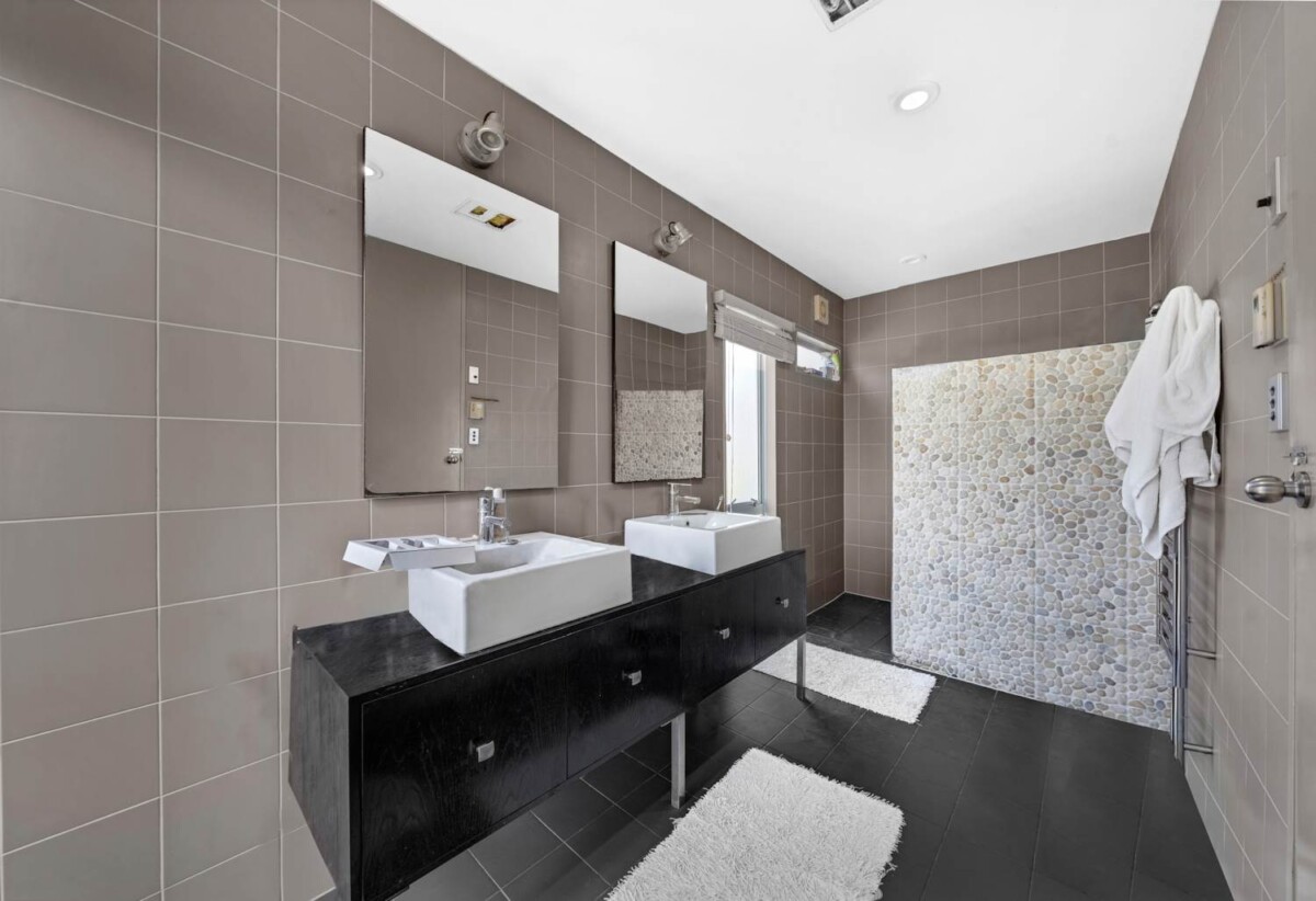 5052m2 section, 6 beds 4 baths ( 5 beds 3 baths triple garage main house + standalone 1 bed 1 bath kitchen, living and garage sleepout) house, with a heated swimming pool, Surrounded by established greenery, close to local amenities, schools, and motorway connections, 1.2 km to Alfriston College and Alfriston School, 21 Everlea Place, Alfriston, Auckland