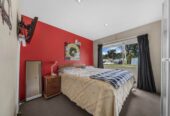 5052m2 section, 6 beds 4 baths ( 5 beds 3 baths triple garage main house + standalone 1 bed 1 bath kitchen, living and garage sleepout) house, with a heated swimming pool, Surrounded by established greenery, close to local amenities, schools, and motorway connections, 1.2 km to Alfriston College and Alfriston School, 21 Everlea Place, Alfriston, Auckland