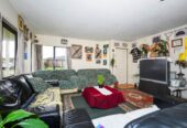 142m2 Brick and tile 4 beds 2.5 baths house with double garage on 475m2 section, Currently leased to Housing New Zealand until 30 November 2028, with annual gross rental income of $38,480, close to shops, schools, motorway access, 0.5 km to Jean Batten School, 1 Orrell Place, Mangere, Auckland