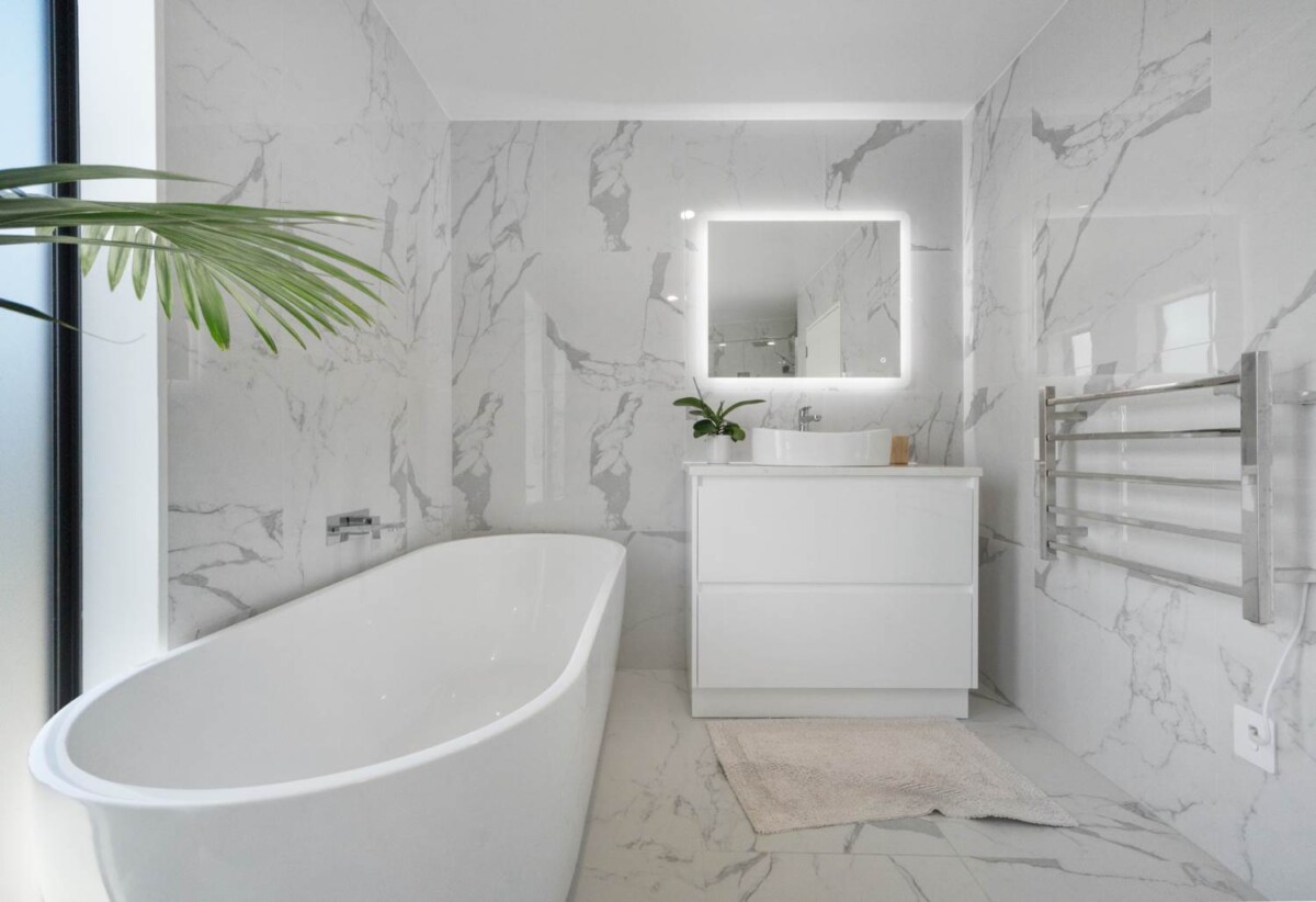 Brick & concrete construction, 4 beds 3.5 baths home with garage, Private rooftop entertaining with water views, just moments from waterfront park, the local rowing club, and Panmure Shopping Centre, 0.1 km to Panmure Bridge School, 90A Kings Road, Panmure, Auckland