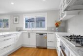 294m2 4 beds 3.5 baths house with double garage on 451m2 section, A private downstairs suite, complete with its own bedroom, bathroom, living area, and separate entrance, close to schools, shops, beach, motorway access, 0.7 km to Hauraki School, 1.3 km to Takapuna Grammar School, 18 Hart Road, Hauraki, Auckland