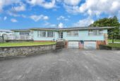 With RC for 6 Homes on 812 m2 corner site, 4 beds 1 bath house with double garage, just a short stroll from Mountfort Park and a short drive to Manurewa town, the railway station and Motorway ramps, 0.3 km to Leabank School, 18 Mountfort Street, Manurewa, Auckland