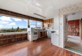 Develop/ Do Up Opportunity On 1189m² Elevated Site, 4 beds 1 bath home upstairs, 1 bed 1 flexi room 1 bath downstairs, double garage, this 190m2 house needs renovation, Motivated Owners, close to schools, shops, motorway access, 0.4 km to Hillsborough School, 16 Kelsey Crescent, Hillsborough, Auckland