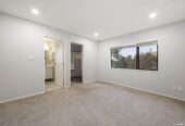 Modern Split-Level Living with Income Potential, 4 beds 3 baths house with garage on 574m2 section, close to schools, shops, motorway access, 0.7 km to Royal Road School, 5A Benchmark Drive, Massey, Auckland