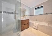 Brick and tile 4 beds + study room 2 baths house with double garage on 575m2 section, Close to a local reserve and playground, walking distance to shops, and just minutes to Albany Mega Centre, motorway access, In zone for Oteha Valley School, Northcross Intermediate, and Long Bay College, 0.5 km to Oteha Valley School, 8 Nimstedt Avenue, Oteha, Auckland
