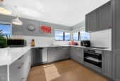 Rangitoto College zone, 4 beds 2 baths house with swimming pool on 684m2 section, 2 beds upstairs and two downstairs, along with two bathrooms, including a semi-ensuite. within walking distance to Browns Bay Beach, shops, and a local kindergarten, 0.6 km to Sherwood School (Auckland), 30 Oaktree Avenue, Browns Bay, Auckland