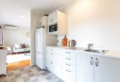 Home and income, 657m2 section, upstairs 3 beds 1 bath kiitchen and lounge, downstairs 2 beds + large flexi room 1.5 baths kitchen and lounge, easy motorway access. Only a leisurely walk to Mt Albert Pak’n Save, local cafés, 0.8 km to Avondale Primary School (Auckland), 77 Bollard Avenue, New Windsor, Auckland