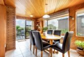 Home and income, 657m2 section, upstairs 3 beds 1 bath kiitchen and lounge, downstairs 2 beds + large flexi room 1.5 baths kitchen and lounge, easy motorway access. Only a leisurely walk to Mt Albert Pak’n Save, local cafés, 0.8 km to Avondale Primary School (Auckland), 77 Bollard Avenue, New Windsor, Auckland