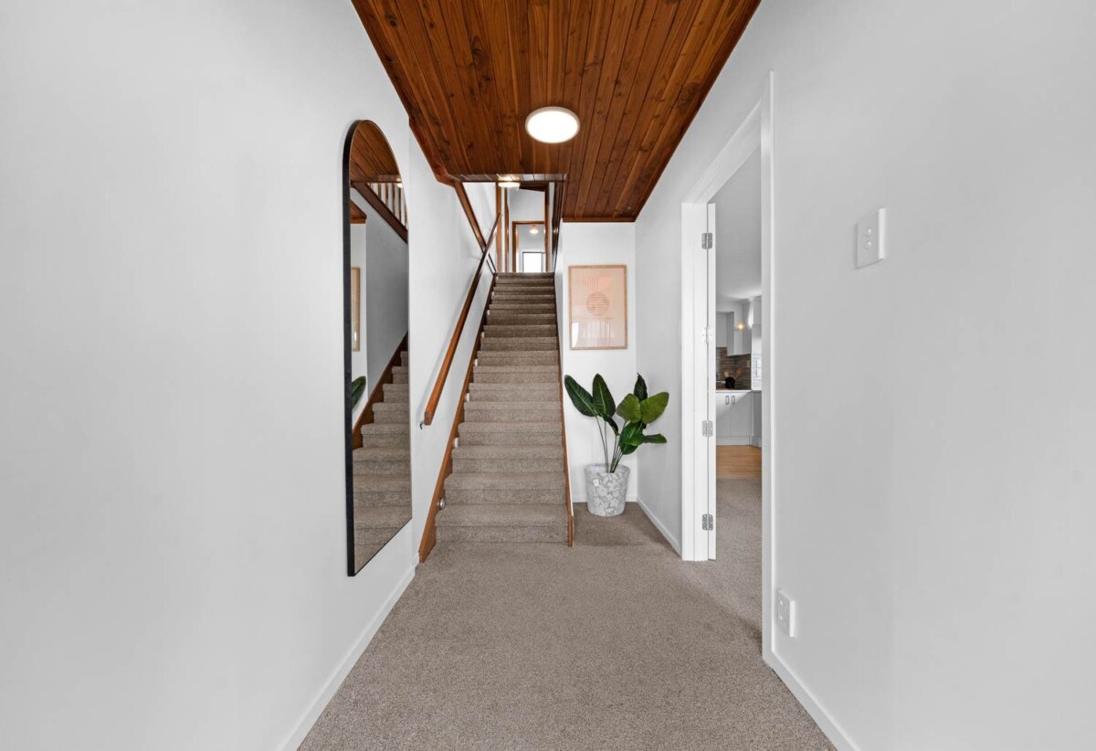 Home and income, solid brick and concrete block home, upstairs 2 beds + large sunroom 1 bath kitchen and lounge, downstairs 2 beds + large utility room 1 bath kitchen and lounge, close to motorway access, schools, supermarkets, 0.9 km to New Windsor School, 363C Richardson Road, Mt Roskill, Auckland