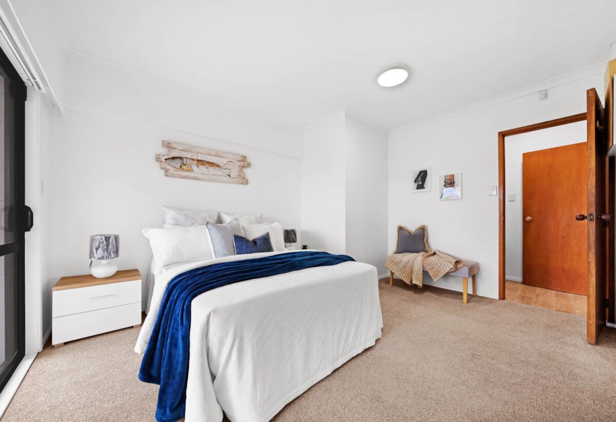 Home and income, solid brick and concrete block home, upstairs 2 beds + large sunroom 1 bath kitchen and lounge, downstairs 2 beds + large utility room 1 bath kitchen and lounge, close to motorway access, schools, supermarkets, 0.9 km to New Windsor School, 363C Richardson Road, Mt Roskill, Auckland