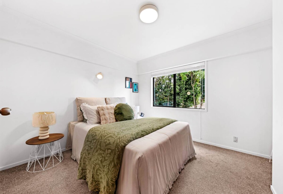 Home and income, solid brick and concrete block home, upstairs 2 beds + large sunroom 1 bath kitchen and lounge, downstairs 2 beds + large utility room 1 bath kitchen and lounge, close to motorway access, schools, supermarkets, 0.9 km to New Windsor School, 363C Richardson Road, Mt Roskill, Auckland