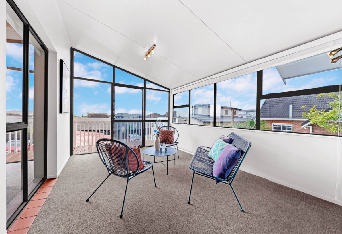 Home and income, solid brick and concrete block home, upstairs 2 beds + large sunroom 1 bath kitchen and lounge, downstairs 2 beds + large utility room 1 bath kitchen and lounge, close to motorway access, schools, supermarkets, 0.9 km to New Windsor School, 363C Richardson Road, Mt Roskill, Auckland
