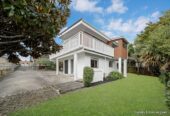 Home and income, solid brick and concrete block home, upstairs 2 beds + large sunroom 1 bath kitchen and lounge, downstairs 2 beds + large utility room 1 bath kitchen and lounge, close to motorway access, schools, supermarkets, 0.9 km to New Windsor School, 363C Richardson Road, Mt Roskill, Auckland