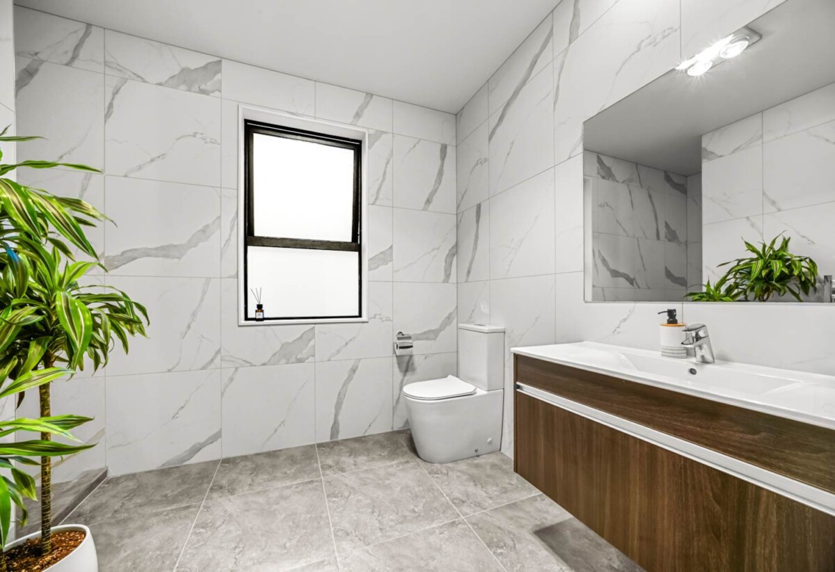 5 beds (3 ensuites) 4.5 baths house with double garage on 460m2 section, a short stroll to Long Bay Village dining, retail, and top-tier schooling at Long Bay Primary and College, beach, 8 Carex Way, Long Bay, Auckland