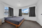 Mt Roskill Grammar zone, 3 beds 1 bath house with standalone garage on 895m2 section, Ground-floor rumpus with exterior access – home office or studio ready, close to schools, shops, motorway access, 0.6 km to Hay Park School, 9 Morrie Laing Avenue, Mt Roskill, Auckland