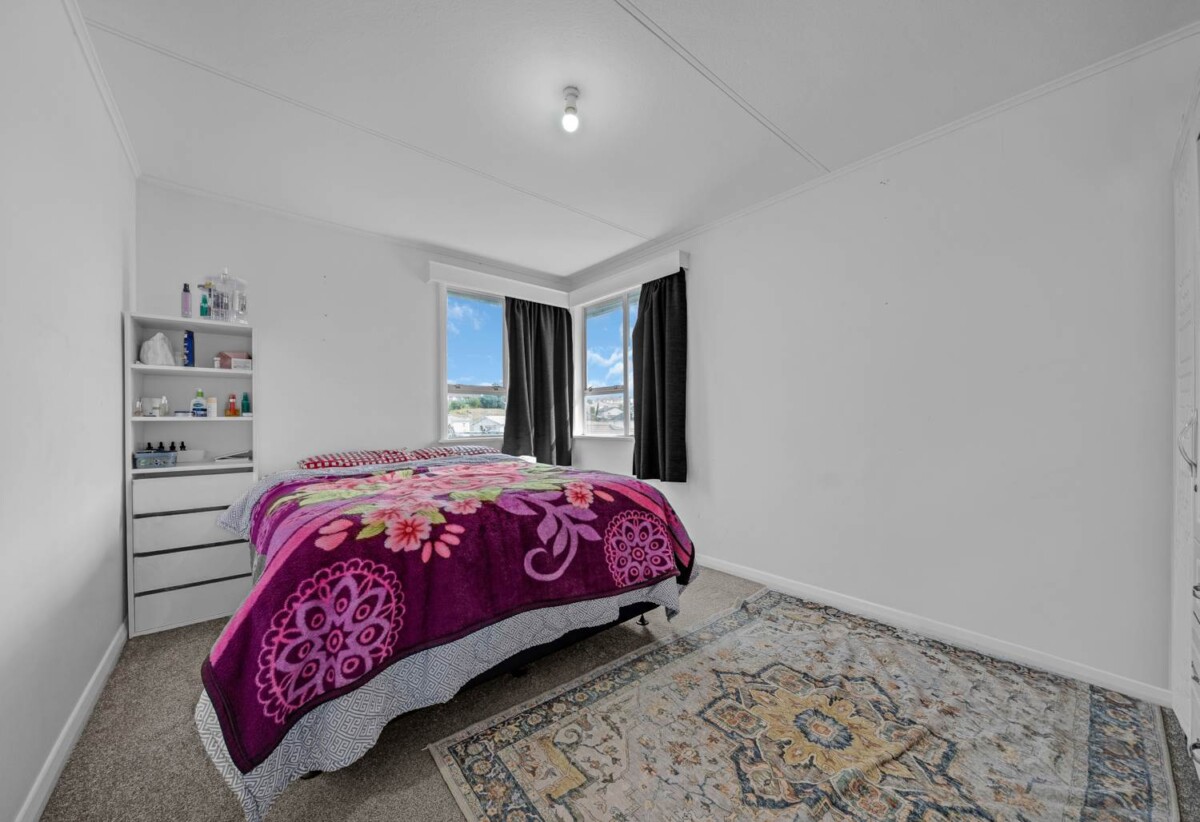 Mt Roskill Grammar zone, 3 beds 1 bath house with standalone garage on 895m2 section, Ground-floor rumpus with exterior access – home office or studio ready, close to schools, shops, motorway access, 0.6 km to Hay Park School, 9 Morrie Laing Avenue, Mt Roskill, Auckland