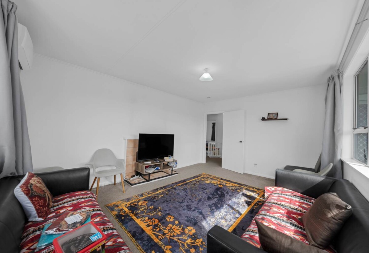 Mt Roskill Grammar zone, 3 beds 1 bath house with standalone garage on 895m2 section, Ground-floor rumpus with exterior access – home office or studio ready, close to schools, shops, motorway access, 0.6 km to Hay Park School, 9 Morrie Laing Avenue, Mt Roskill, Auckland
