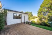 Modern Split-Level Living with Income Potential, 4 beds 3 baths house with garage on 574m2 section, close to schools, shops, motorway access, 0.7 km to Royal Road School, 5A Benchmark Drive, Massey, Auckland