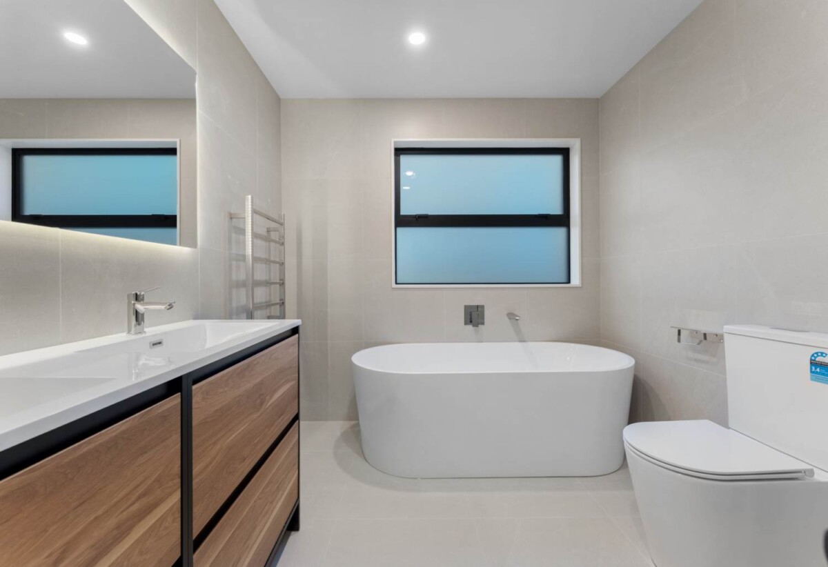 Brandnew 4 beds 3 baths house with garage, 1 bed 1 bath ground floor, minutes from Westgate and Northwest shopping centres, Costco, local schools, parks, and motorway access, 5b Neinei Street, Westgate, Auckland