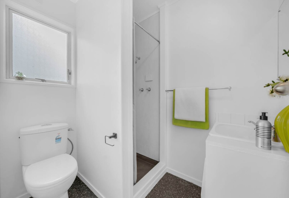 2 beds 1 bath home with carport, a storage unit and a small garden, close to the train station, bus stops, parks, LynnMall, schools, 0.7 km to Kelston School, 2/22 Koromiko Street, New Lynn, Auckland