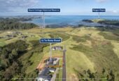 4 beds 3 baths house with double garage on 1897m2 section, A massive 180 m2 deck designed for legendary summer gatherings. Located in a secure, gated community, 3.4 km to Long Bay School, 11 Te Rata Road, Okura Bush, Auckland