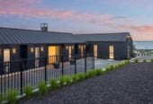4 beds 3 baths house with double garage on 1897m2 section, A massive 180 m2 deck designed for legendary summer gatherings. Located in a secure, gated community, 3.4 km to Long Bay School, 11 Te Rata Road, Okura Bush, Auckland