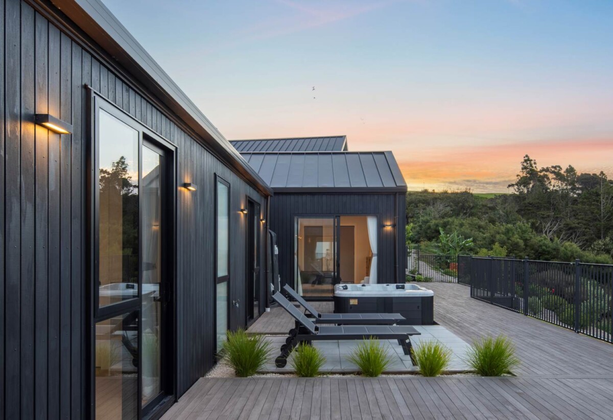 4 beds 3 baths house with double garage on 1897m2 section, A massive 180 m2 deck designed for legendary summer gatherings. Located in a secure, gated community, 3.4 km to Long Bay School, 11 Te Rata Road, Okura Bush, Auckland