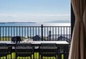 4 beds 3 baths house with double garage on 1897m2 section, A massive 180 m2 deck designed for legendary summer gatherings. Located in a secure, gated community, 3.4 km to Long Bay School, 11 Te Rata Road, Okura Bush, Auckland