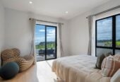 4 beds 3 baths house with double garage on 1897m2 section, A massive 180 m2 deck designed for legendary summer gatherings. Located in a secure, gated community, 3.4 km to Long Bay School, 11 Te Rata Road, Okura Bush, Auckland