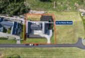 4 beds 3 baths house with double garage on 1897m2 section, A massive 180 m2 deck designed for legendary summer gatherings. Located in a secure, gated community, 3.4 km to Long Bay School, 11 Te Rata Road, Okura Bush, Auckland