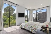 Next to a lush native reserve, 545m2 8 beds 5.5 baths house with double garage on 3536m2 section, 2-beds granny, Private home theatre with a 160” screen, Dolby Vision + Atmos, and a built-in bar, hree-phase power with full EV charging station, close to schools, Ormiston shopping centre, 326 Flat Bush School Road, Flat Bush, Auckland