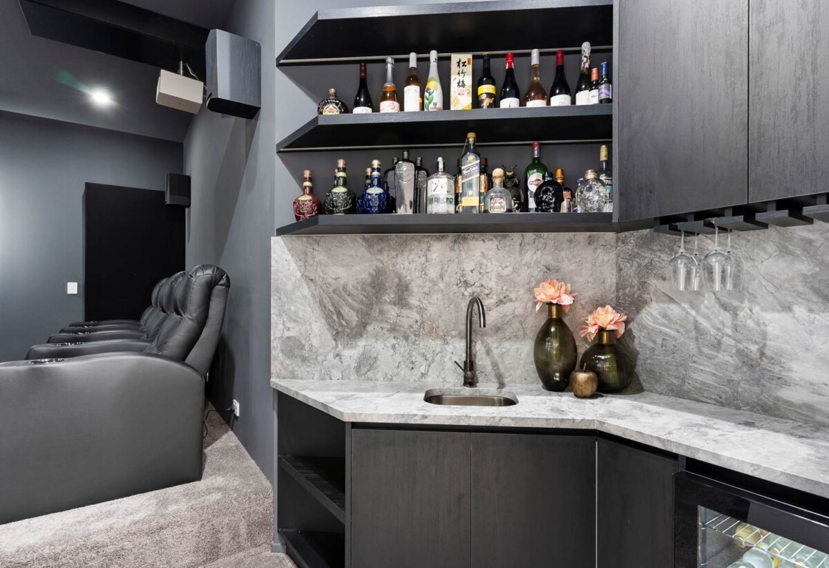 Next to a lush native reserve, 545m2 8 beds 5.5 baths house with double garage on 3536m2 section, 2-beds granny, Private home theatre with a 160” screen, Dolby Vision + Atmos, and a built-in bar, hree-phase power with full EV charging station, close to schools, Ormiston shopping centre, 326 Flat Bush School Road, Flat Bush, Auckland