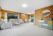 4 beds 2 baths house with double garage and views, Construction: Durable Hardiplank exterior with a classic metal tile roof. 1 km to Long Bay College, 1/15 Flavia Close, Torbay, Auckland