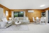 4 beds 2 baths house with double garage and views, Construction: Durable Hardiplank exterior with a classic metal tile roof. 1 km to Long Bay College, 1/15 Flavia Close, Torbay, Auckland