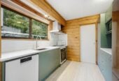 4 beds 2 baths house with double garage and views, Construction: Durable Hardiplank exterior with a classic metal tile roof. 1 km to Long Bay College, 1/15 Flavia Close, Torbay, Auckland